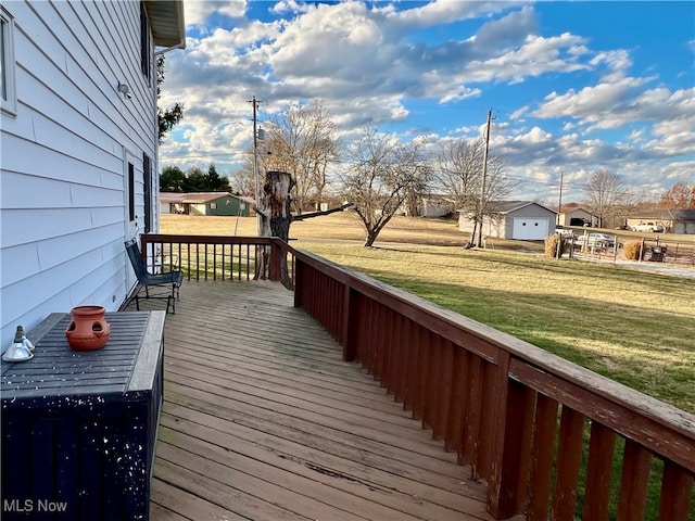 wooden deck with a yard