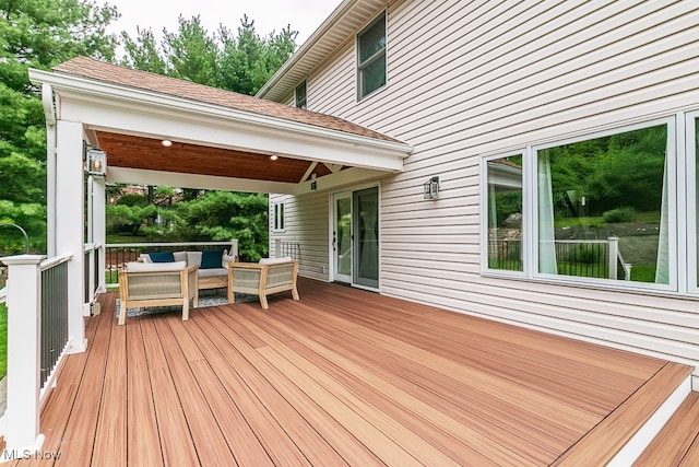 deck featuring outdoor lounge area