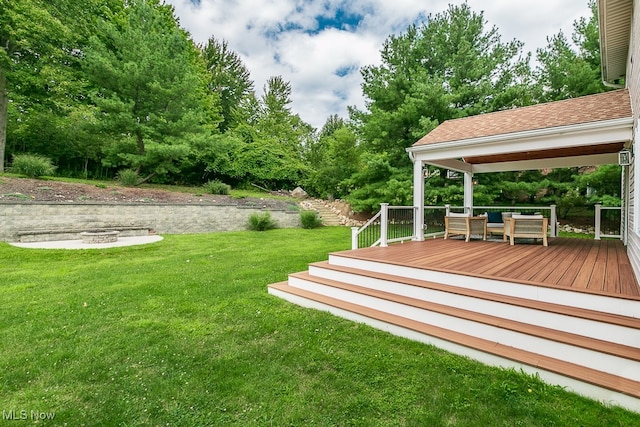 view of yard with a deck