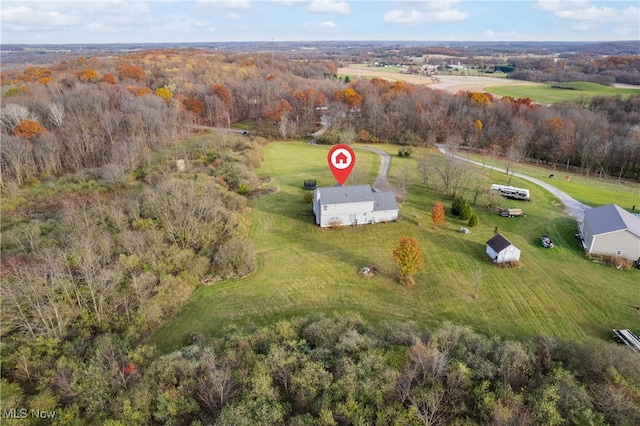 birds eye view of property with a rural view