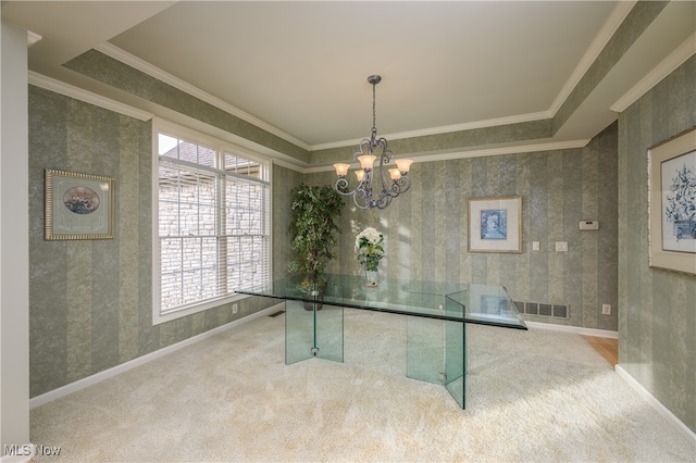 recreation room featuring carpet floors, crown molding, and a chandelier