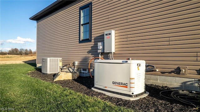 6120 Century Blvd, Canfield, OH 44406 - view of home's exterior with central air condition unit and a lawn