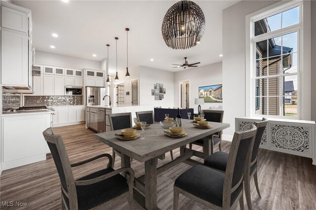 6120 Century Blvd, Canfield, OH 44406 - dining space with wood finished floors, plenty of natural light, a chandelier, recessed lighting, and ceiling fan