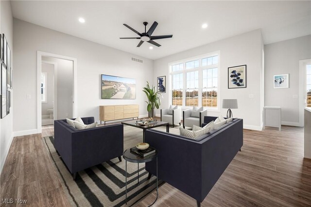 6120 Century Blvd, Canfield, OH 44406 - living area featuring a ceiling fan, wood finished floors, baseboards, and recessed lighting