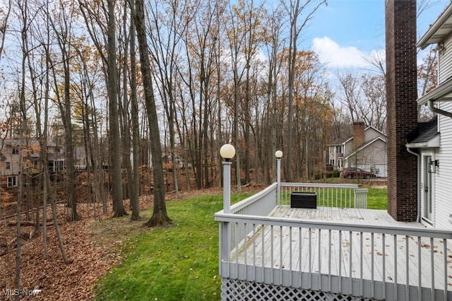 view of yard featuring a wooden deck