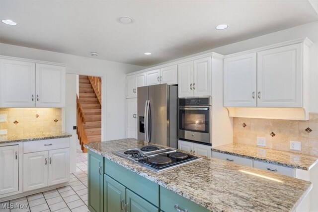 kitchen with white cabinets and stainless steel appliances