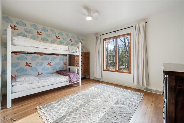 bedroom featuring wood-type flooring