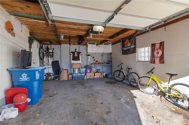 garage featuring a garage door opener