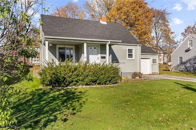 bungalow-style home with a porch, a garage, and a front lawn