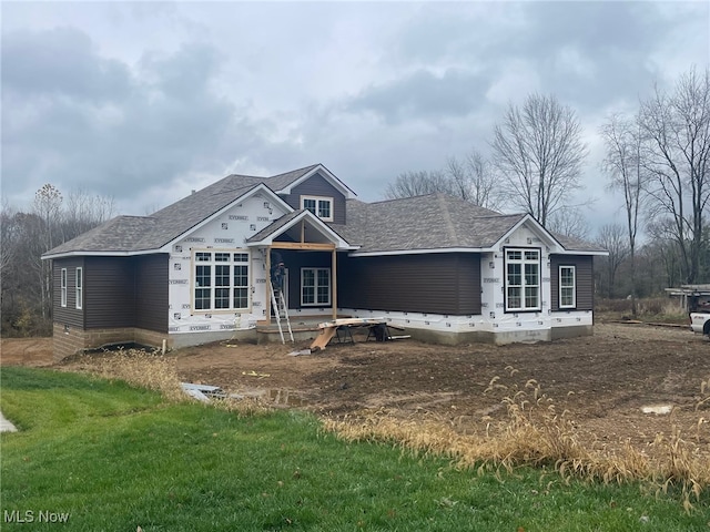 property in mid-construction with crawl space and a shingled roof