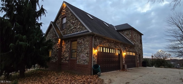 exterior space with a garage