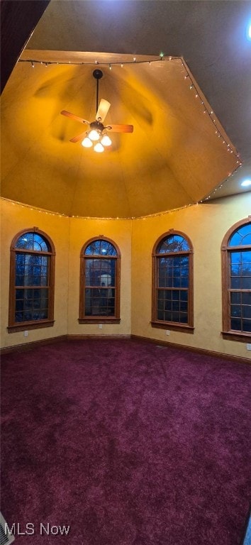 interior space featuring ceiling fan