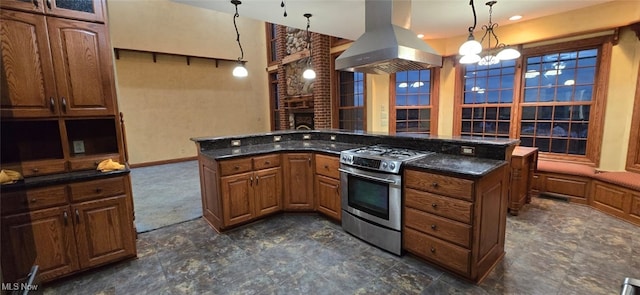 kitchen featuring a kitchen island, a chandelier, decorative light fixtures, stainless steel stove, and exhaust hood