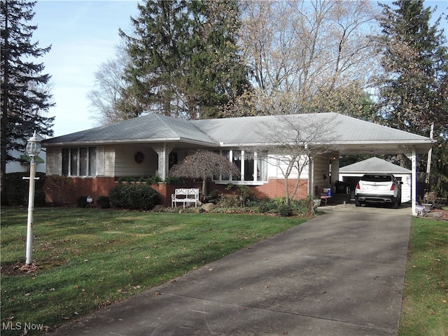 single story home with a front yard and a carport