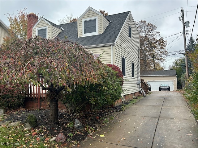 view of front of home with an outbuilding