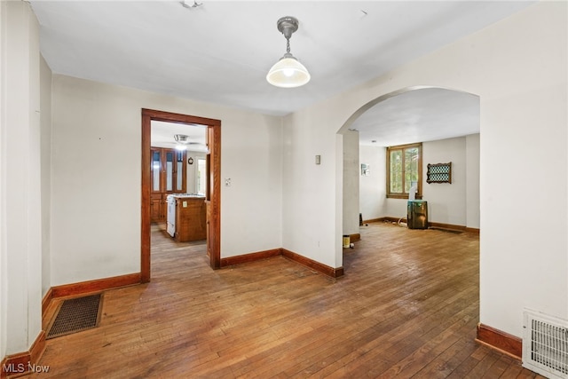 spare room featuring hardwood / wood-style flooring