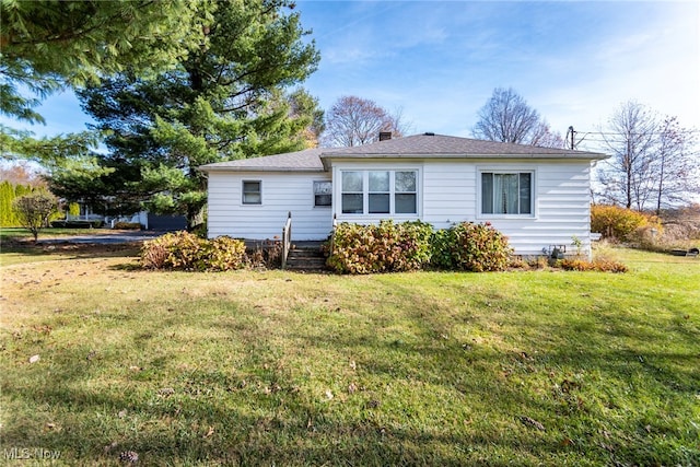 exterior space with a lawn