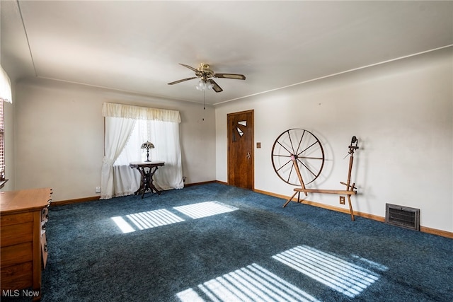 interior space featuring ceiling fan