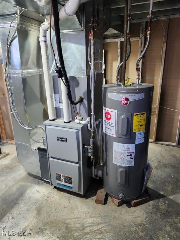 utility room with electric water heater