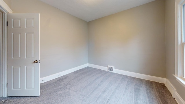 empty room featuring carpet