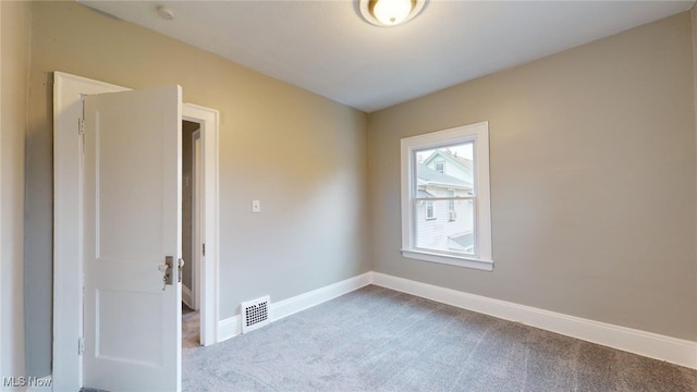 view of carpeted spare room