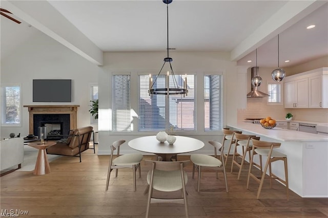 dining room featuring a chandelier and wood-type flooring