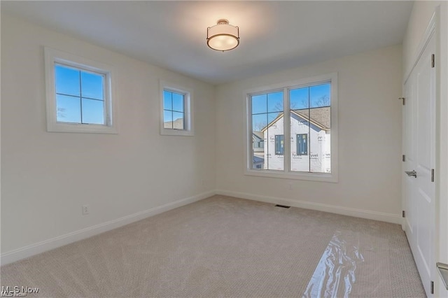 view of carpeted spare room