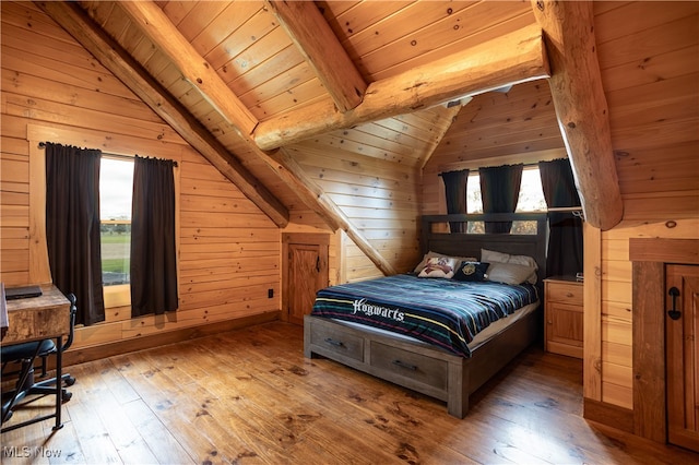 bedroom with hardwood / wood-style floors, vaulted ceiling with beams, wooden walls, and wood ceiling