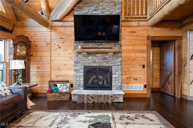 living room featuring wood ceiling, wood walls, beamed ceiling, and dark wood-type flooring