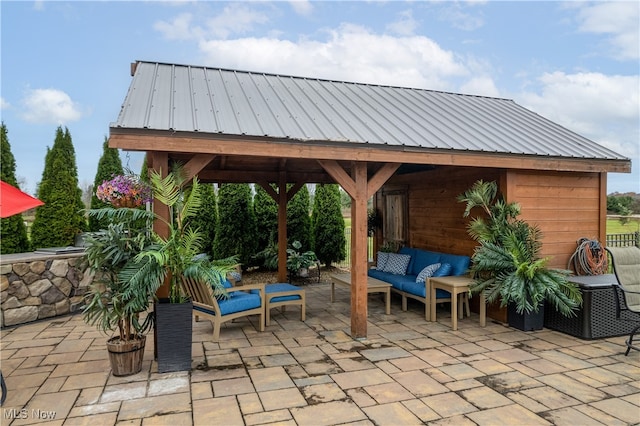 view of patio / terrace with a gazebo and outdoor lounge area