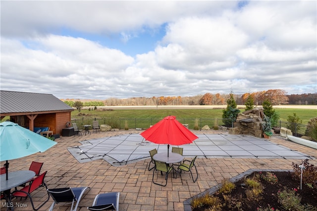 view of patio with a rural view