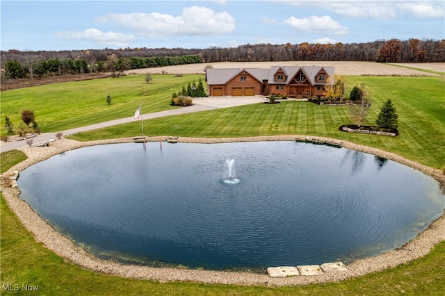 view of pool featuring a rural view and a yard