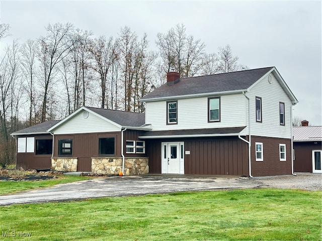 view of front property with a front lawn