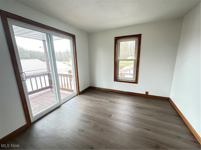 spare room featuring hardwood / wood-style flooring