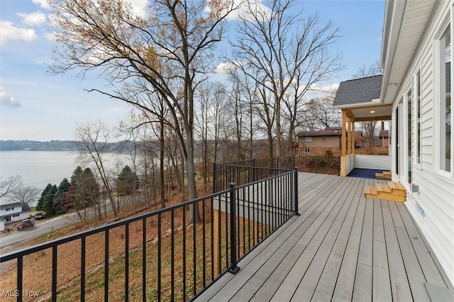 deck featuring a water view