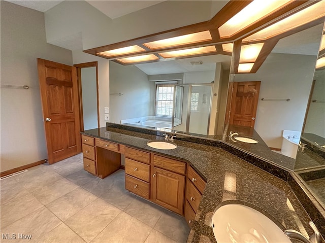 bathroom featuring vanity and shower with separate bathtub