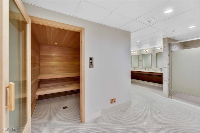 view of sauna featuring carpet flooring