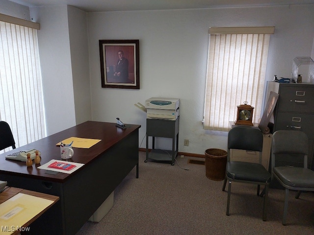 office area with light colored carpet