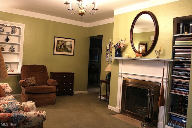 living area featuring carpet and a chandelier