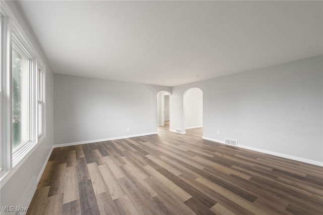 spare room featuring hardwood / wood-style floors