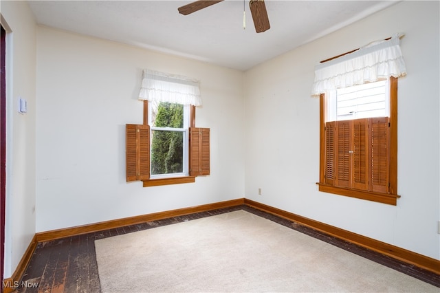 unfurnished room with hardwood / wood-style floors and ceiling fan