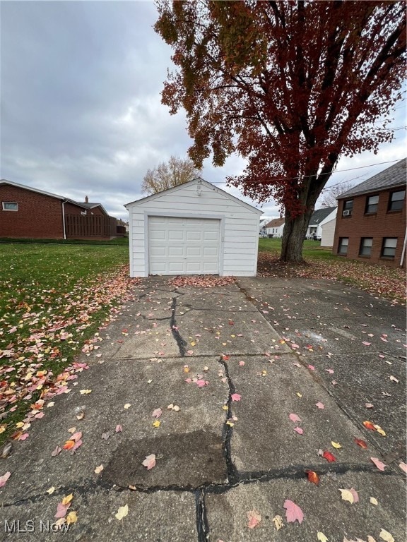 garage featuring a yard