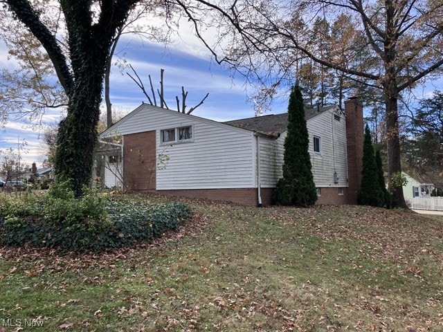 exterior space with a lawn