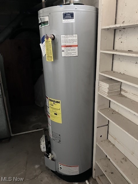 utility room with water heater