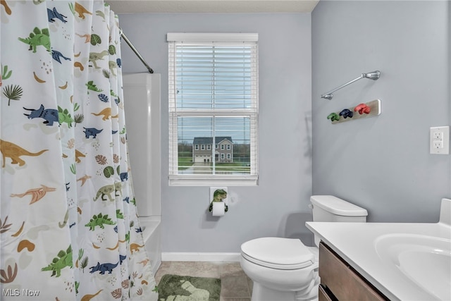 full bathroom featuring tile patterned floors, vanity, toilet, and shower / tub combo with curtain