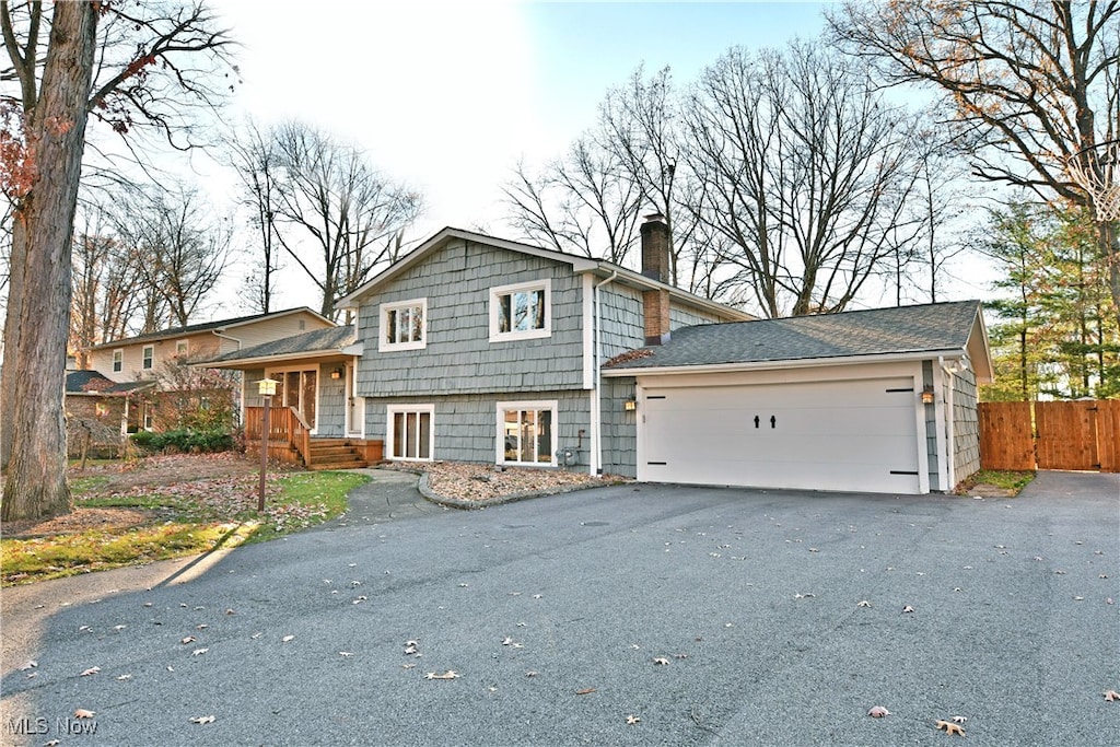 split level home with a garage