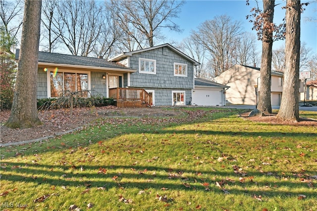 split level home featuring a front lawn and a wooden deck