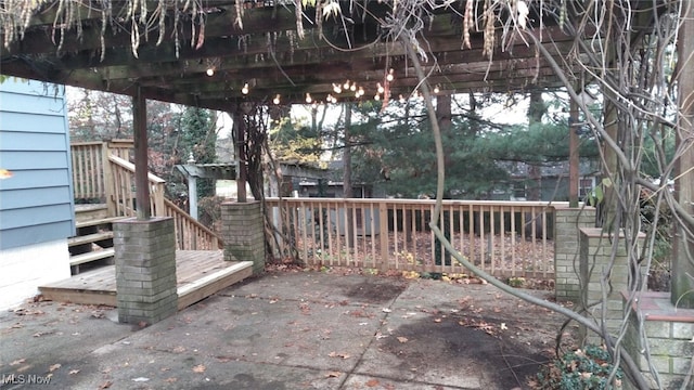 view of patio / terrace featuring a wooden deck