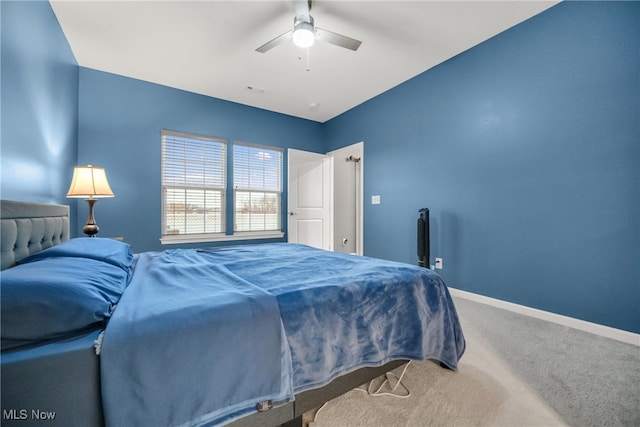 bedroom featuring ceiling fan and carpet floors