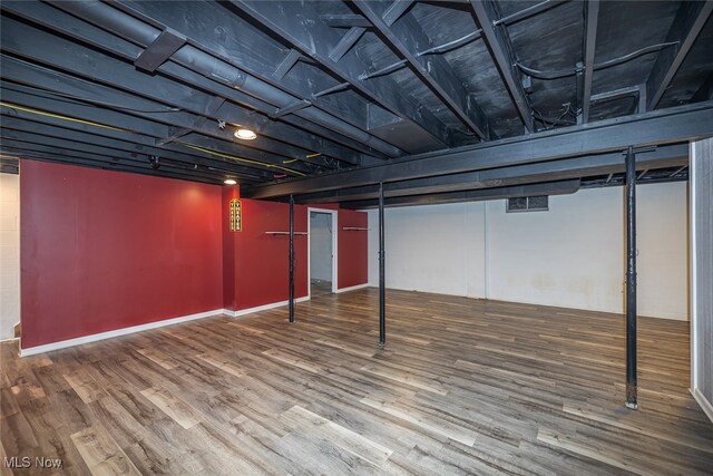 basement featuring hardwood / wood-style flooring